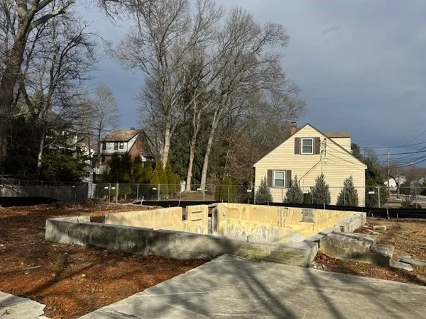 a view of a building with a yard