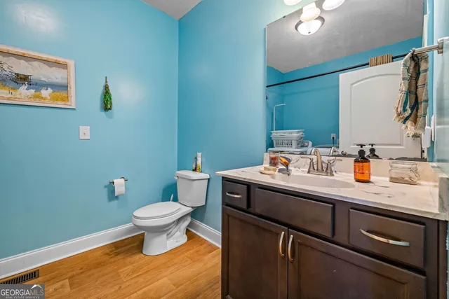 a bathroom with a sink and a toilet