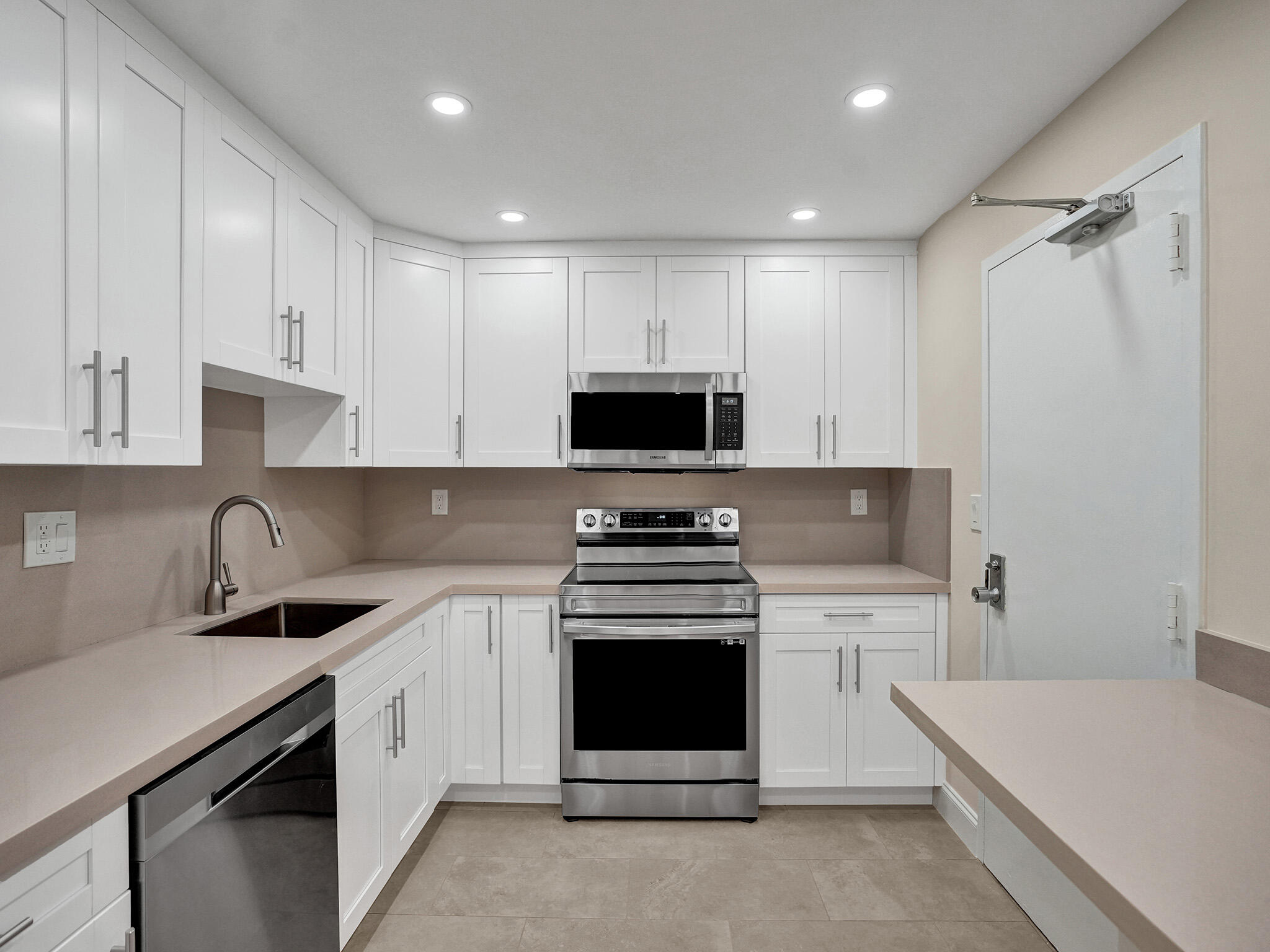 10777 West Sample Road, Unit 1008 Coral Springs, FL 33065 - Photo 1 of 43 Renovated Kitchen
