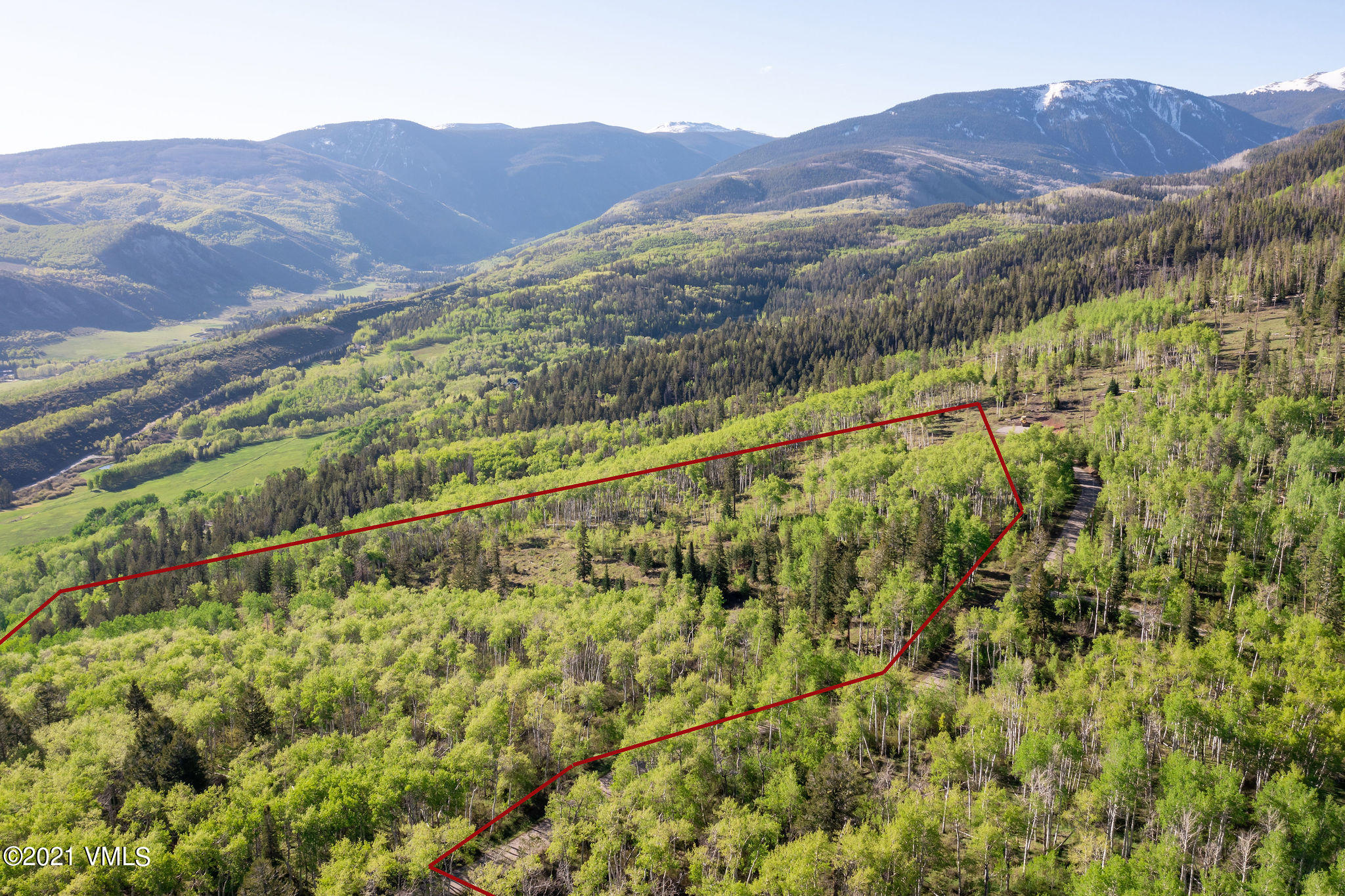 2525 Colorow Road Edwards, CO 81632 - Photo 5 of 20 a view of a mountain with a lush green forest