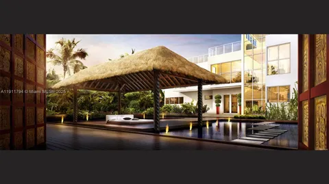 a view of a patio with a table and chairs