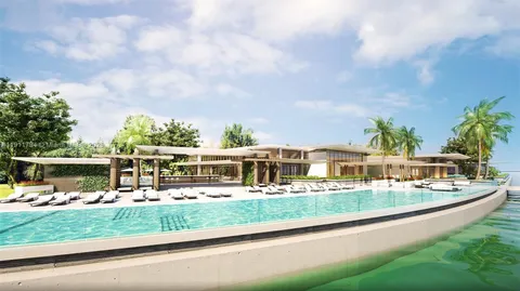 a view of a house with garden and sitting area