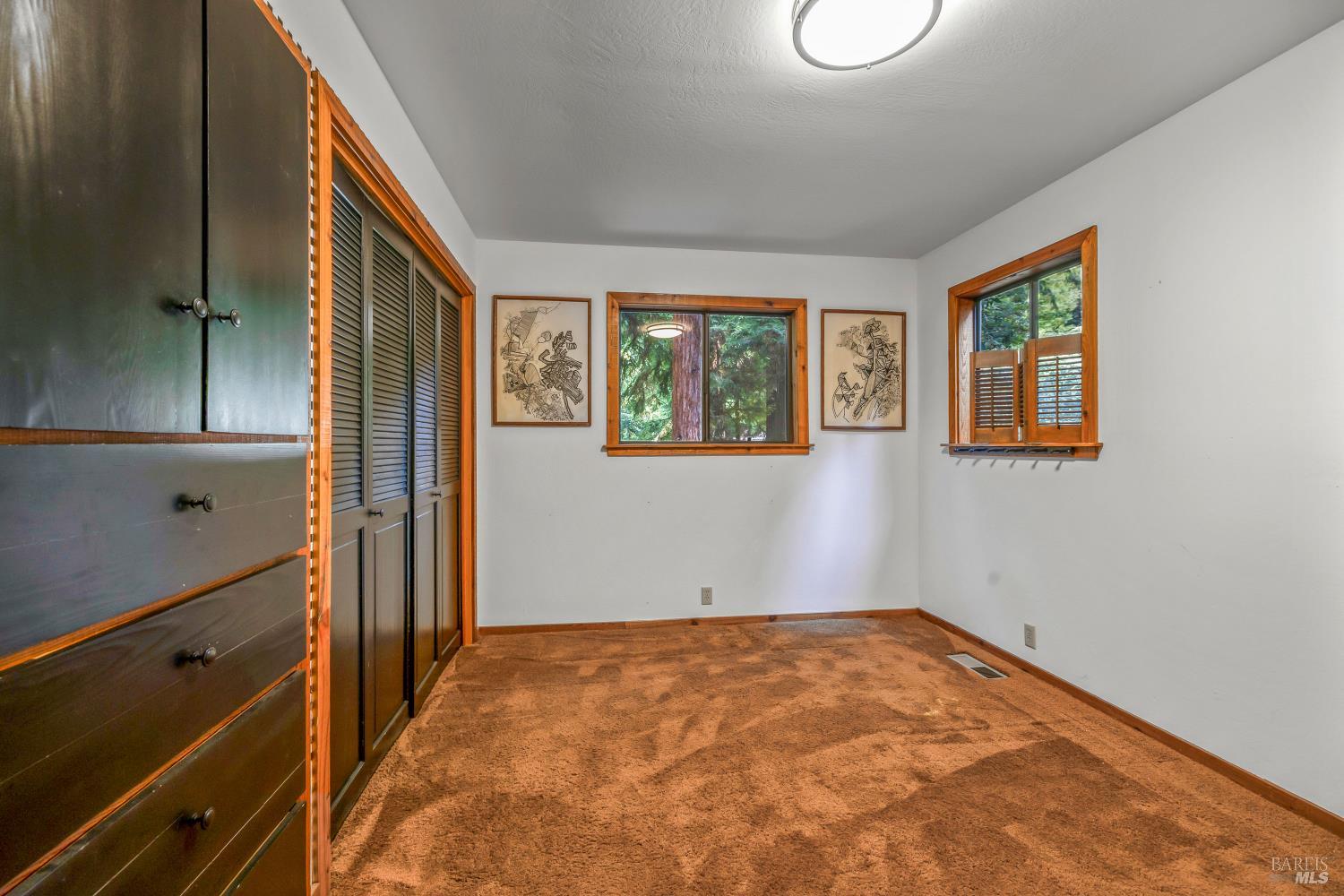 17451 Redwood Springs Drive Fort Bragg, CA 95437 - Photo 14 of 43 an empty room with windows