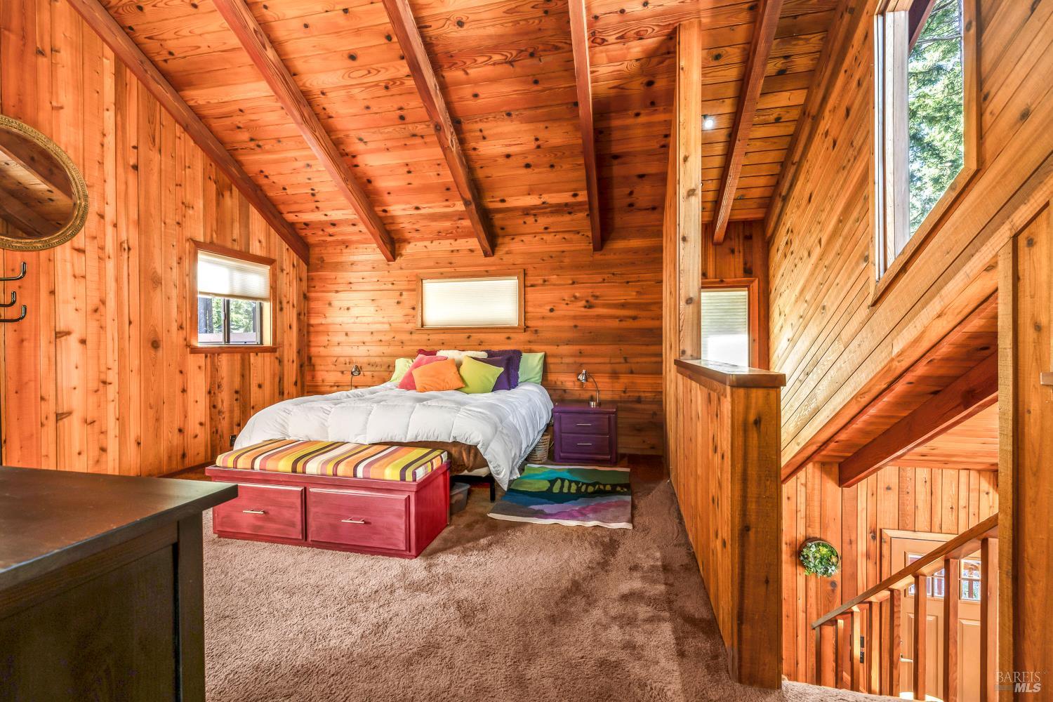 17451 Redwood Springs Drive Fort Bragg, CA 95437 - Photo 25 of 43 a view of a backyard with a table and chairs