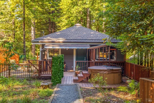 a kitchen with a table chairs stove and cabinets