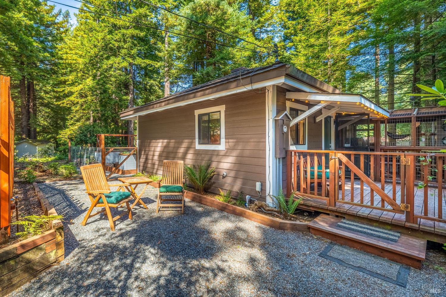 17451 Redwood Springs Drive Fort Bragg, CA 95437 - Photo 31 of 43 a view of a house with backyard and sitting area