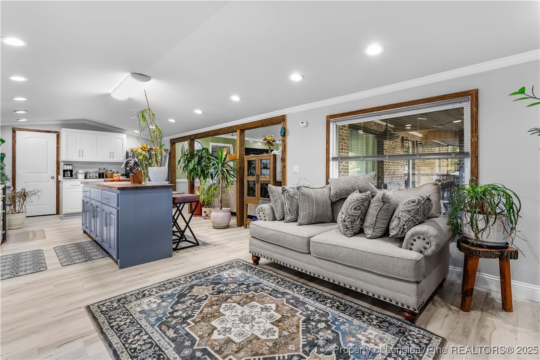 1855 Beaman Woods Road Clinton, NC 28328 - Photo 14 of 50 a living room with furniture and a large window