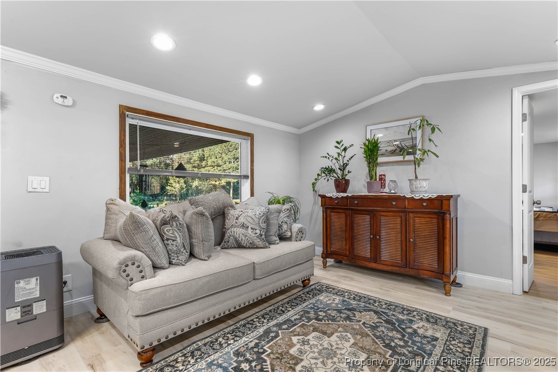 1855 Beaman Woods Road Clinton, NC 28328 - Photo 15 of 50 a living room with furniture and a window