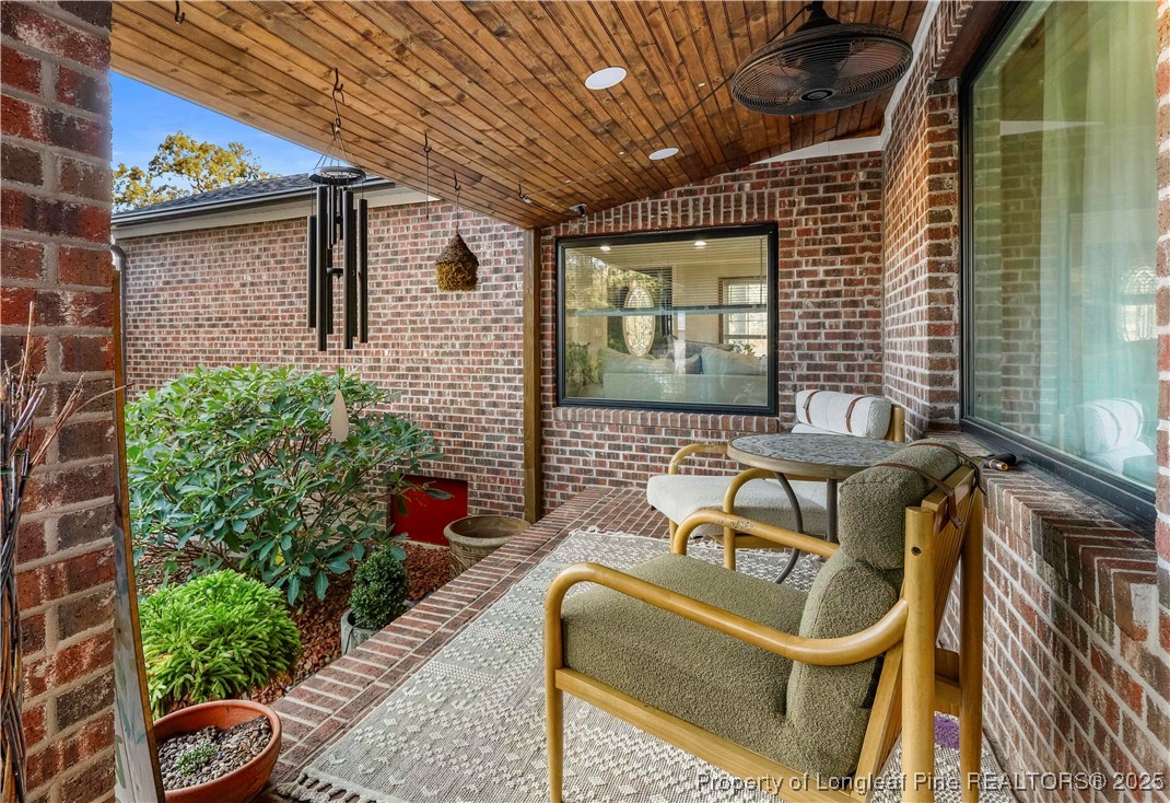 1855 Beaman Woods Road Clinton, NC 28328 - Photo 30 of 50 a front view of a house with outdoor seating