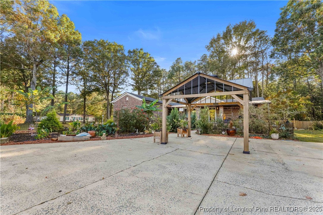 1855 Beaman Woods Road Clinton, NC 28328 - Photo 34 of 50 a view of a street with of a house