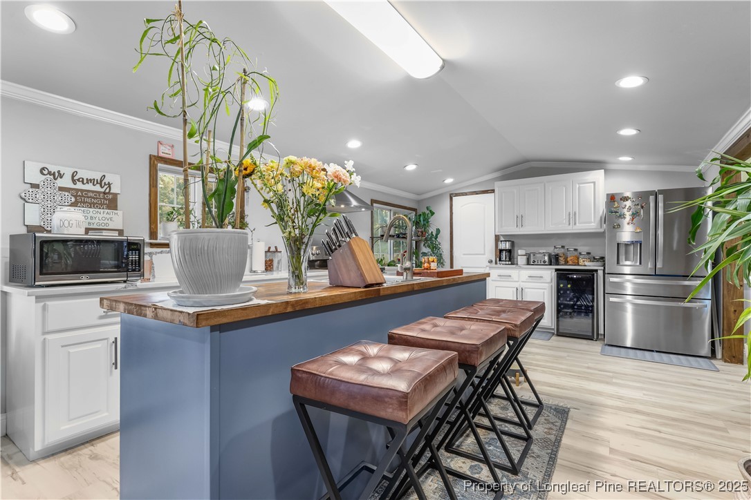 1855 Beaman Woods Road Clinton, NC 28328 - Photo 6 of 50 a kitchen with a table and chairs in it
