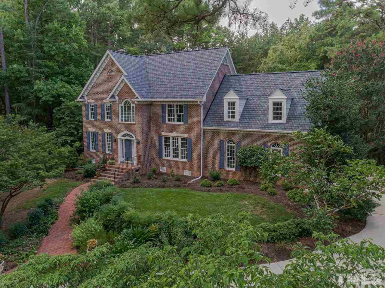 200 Claflin Court Raleigh, NC 27614 - Photo 2 of 13 a view of a house with a yard