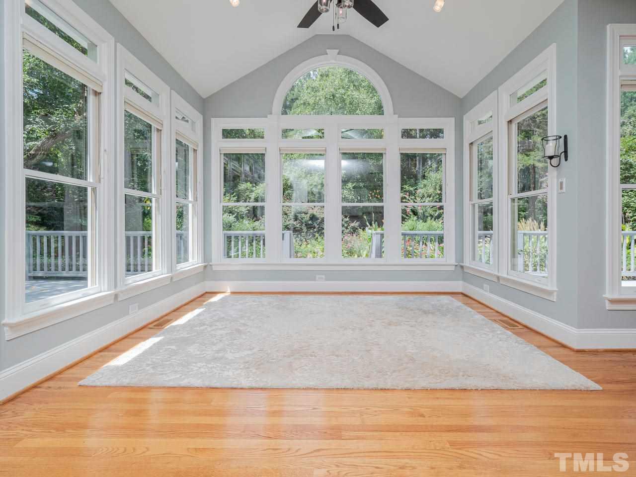 200 Claflin Court Raleigh, NC 27614 - Photo 6 of 13 a view of an entryway with wooden floor and door