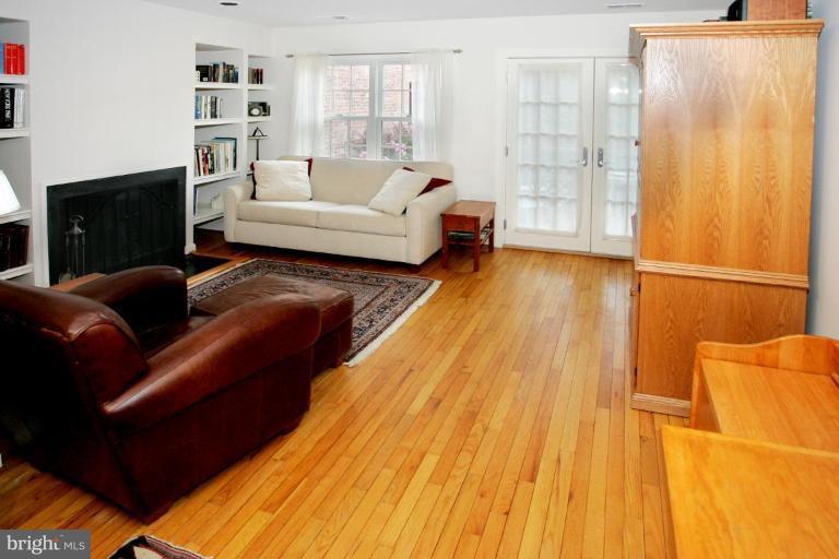 1647 Park Road Northwest Washington, DC 20010 - Photo 6 of 14 Living room with French doors leading to deck
