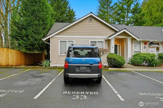 a view of a car in front of house