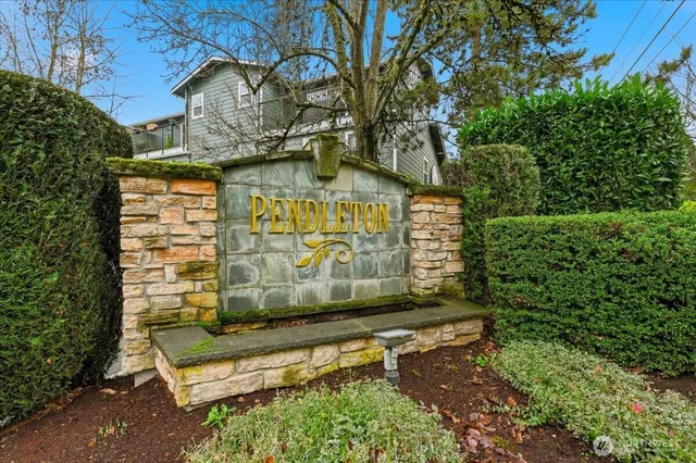 a bench sitting in front of a building