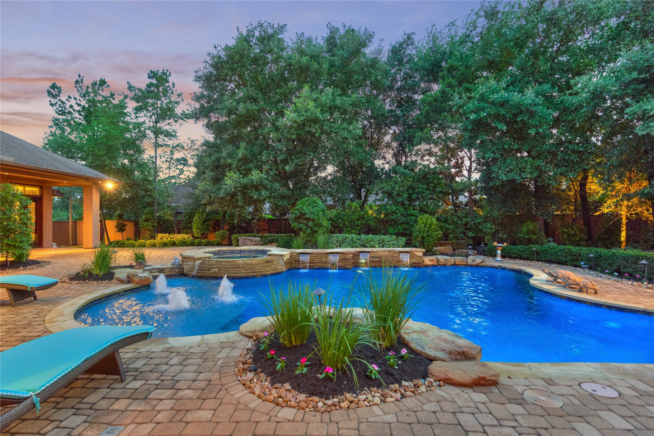 24803 Pearl Crest Lane Spring, TX 77389 - Photo 42 of 50 The property sparkles at night with front and rear exterior LED landscape lighting—beautifully highlighting the privacy of this coveted corner lot.