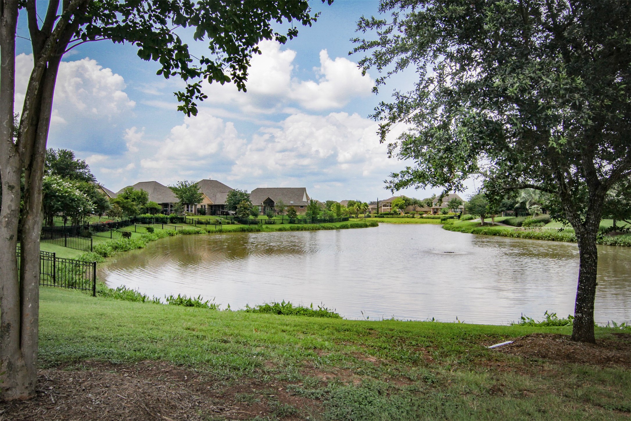 1423 Ralston Branch Way Sugar Land, TX 77479 - Photo 38 of 43 neighborhood lake just a block away with walking trails along the edge
