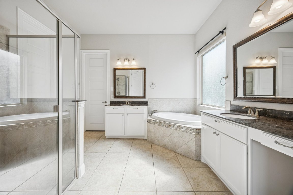 20516 Fairleaf Street Pflugerville, TX 78660 - Photo 19 of 38 Ensuite primary bathroom