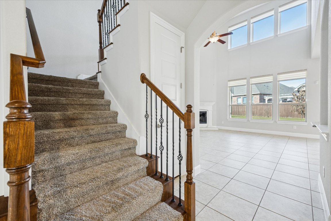 20516 Fairleaf Street Pflugerville, TX 78660 - Photo 22 of 38 Cozy carpeted stairs leading to the second level