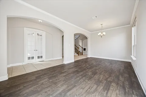 a view of a livingroom with wooden floor