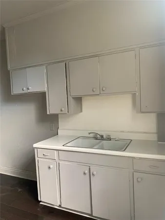 a view of a kitchen with appliances