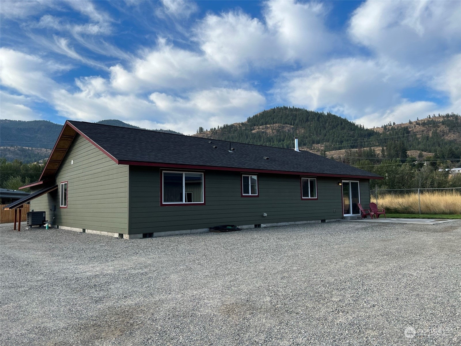 1004 Riverside Avenue Twisp, WA 98856 - Photo 21 of 40 front view of house with a yard