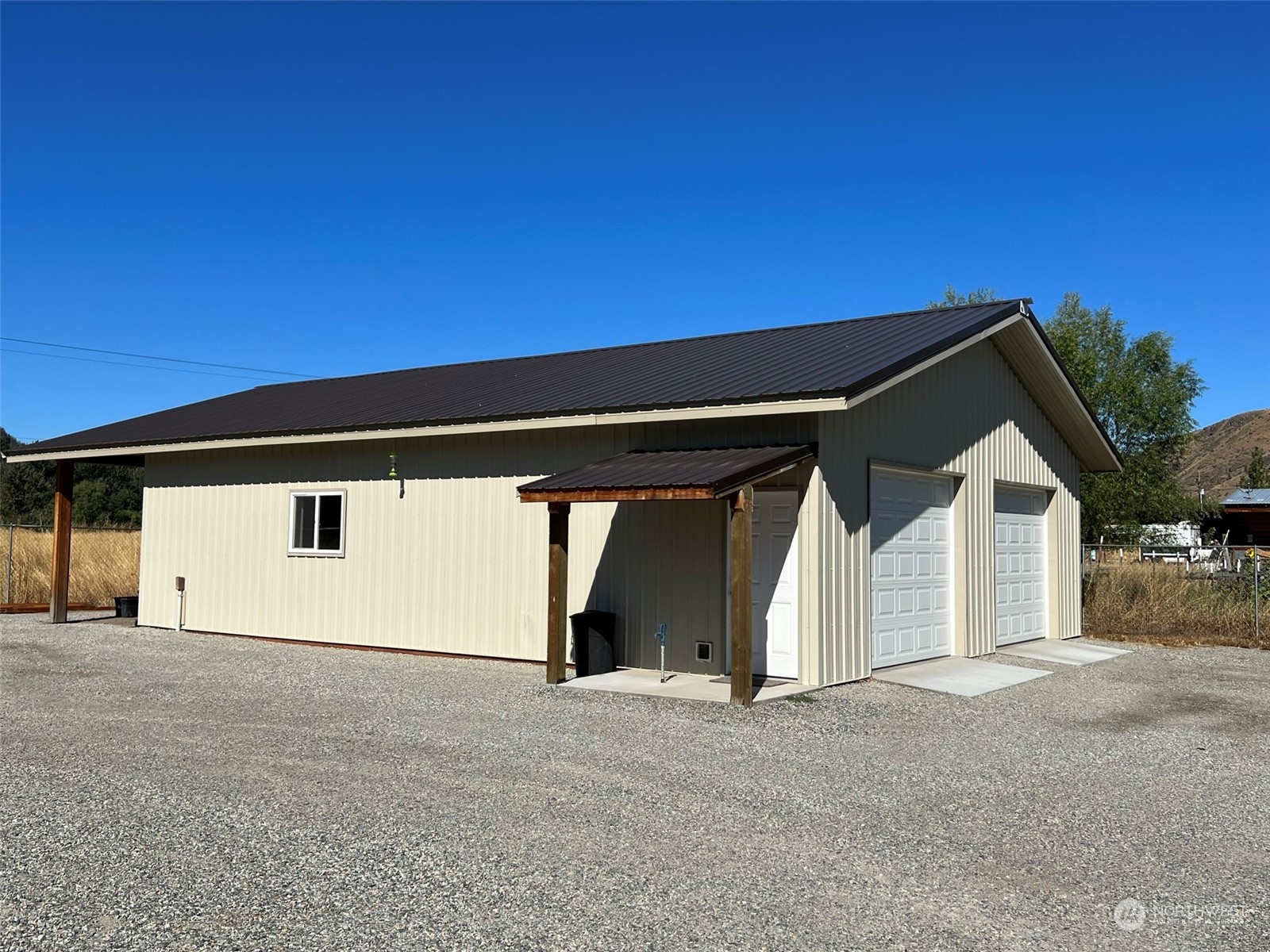 1004 Riverside Avenue Twisp, WA 98856 - Photo 25 of 40 a view of garage and yard