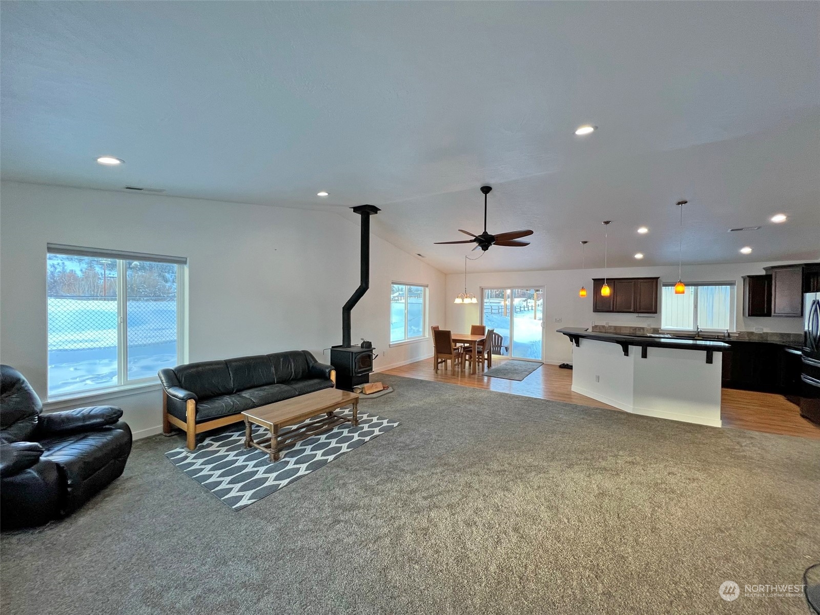 1004 Riverside Avenue Twisp, WA 98856 - Photo 3 of 40 a living room with furniture and a flat screen tv