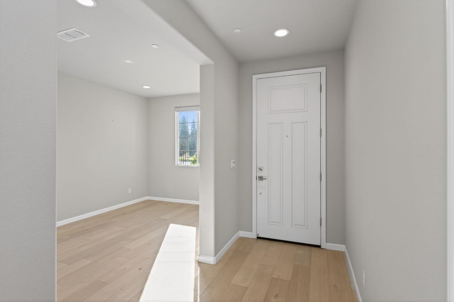 2431 Creekview Drive Merced, CA 95340 - Photo 12 of 38 a view of hallway with a large window
