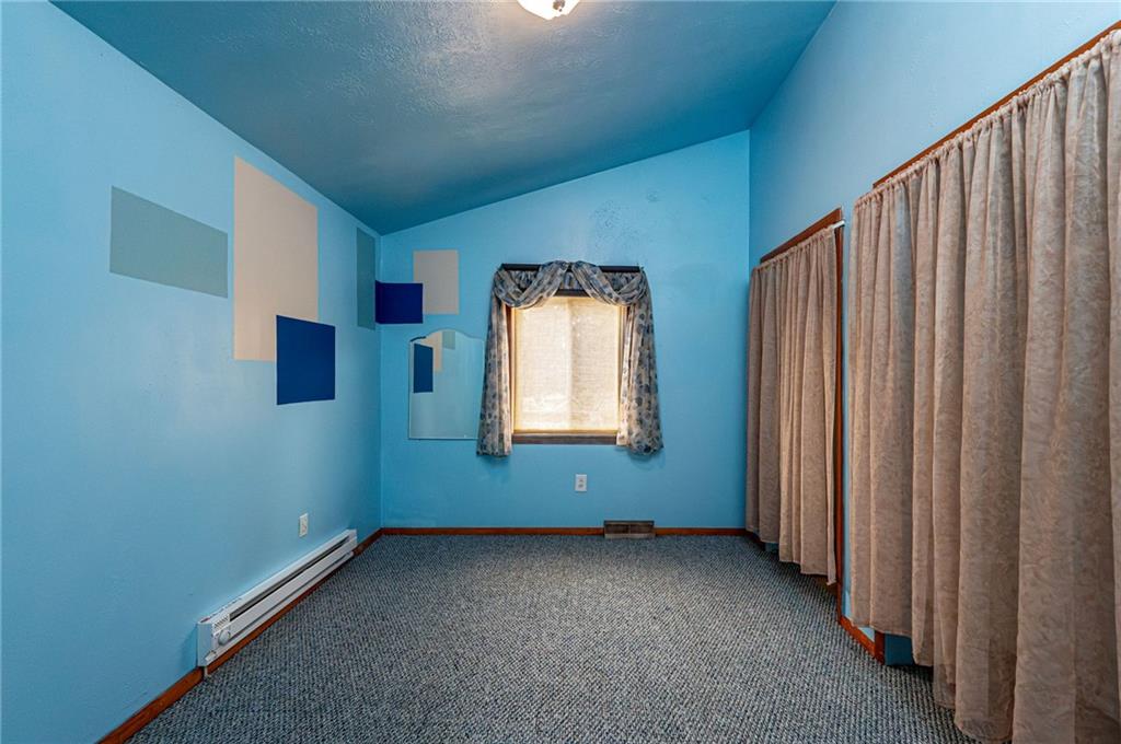 621 Sandy Hill Road Irwin, PA 15642 - Photo 17 of 50 a view of an empty room with a window