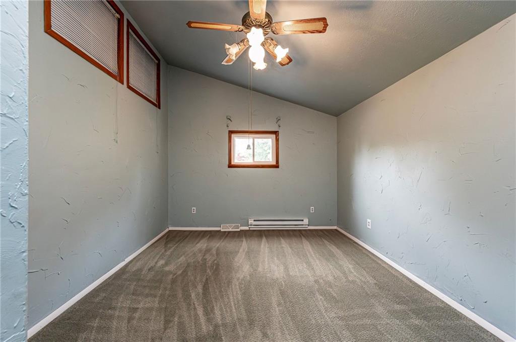 621 Sandy Hill Road Irwin, PA 15642 - Photo 19 of 50 wooden floor in an empty room with a window