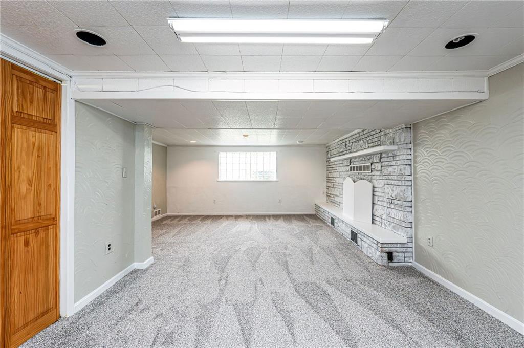 621 Sandy Hill Road Irwin, PA 15642 - Photo 29 of 50 a view of an empty room with a window