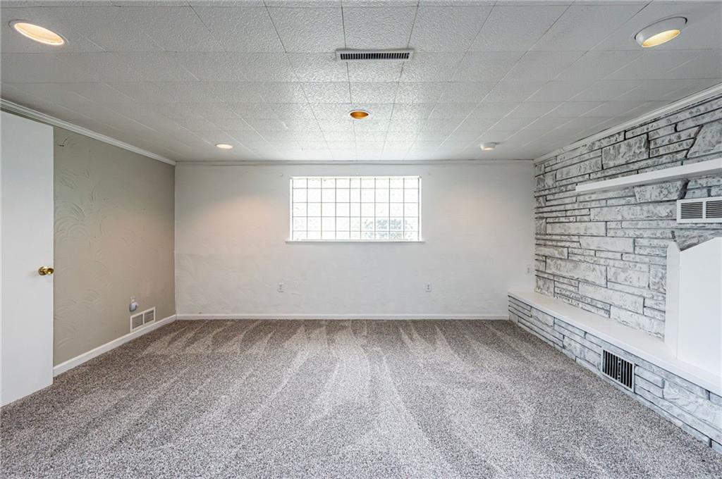 621 Sandy Hill Road Irwin, PA 15642 - Photo 30 of 50 a view of an empty room with a window