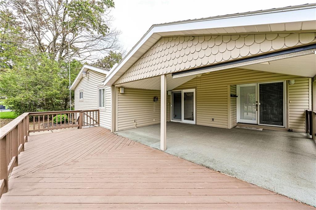 621 Sandy Hill Road Irwin, PA 15642 - Photo 37 of 50 a view of a house with a wooden deck
