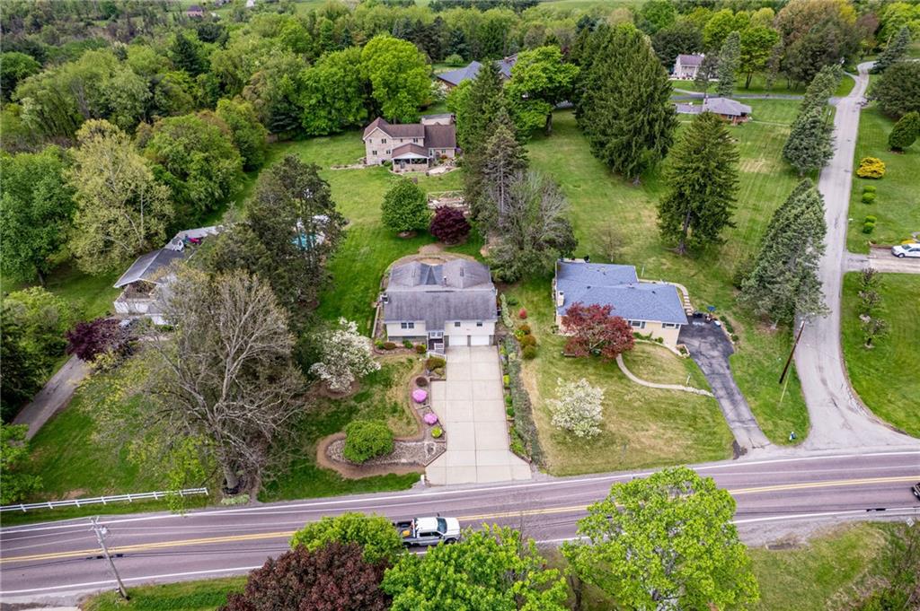 621 Sandy Hill Road Irwin, PA 15642 - Photo 50 of 50 an aerial view of residential house with outdoor space and trees all around