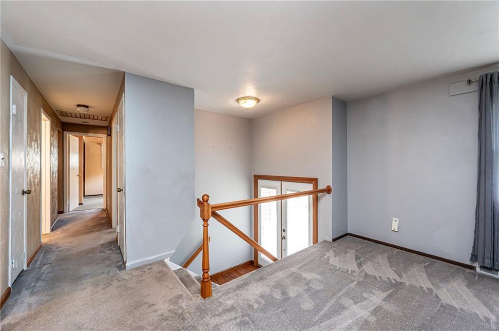 621 Sandy Hill Road Irwin, PA 15642 - Photo 6 of 50 a view of a hallway to other room