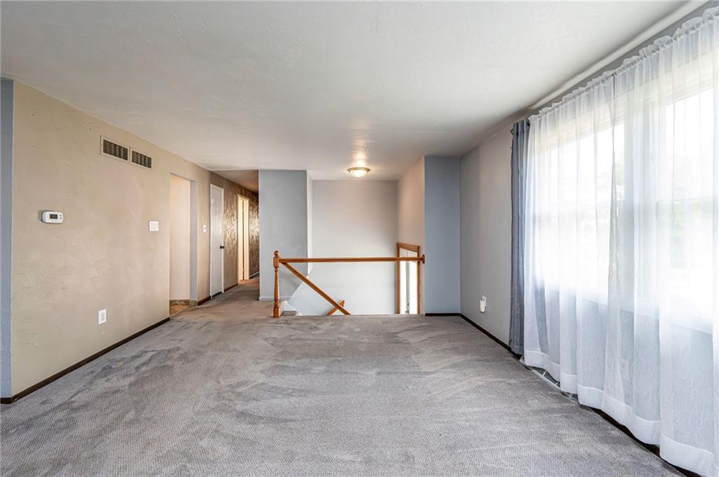 621 Sandy Hill Road Irwin, PA 15642 - Photo 8 of 50 a view of an empty room with a window