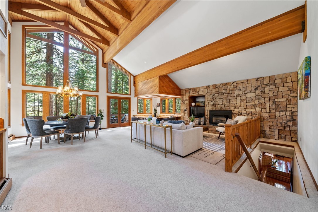 106 Jobs Peak Road Incline Village, NV 89451 - Photo 12 of 49 a living room with furniture a fireplace and large windows