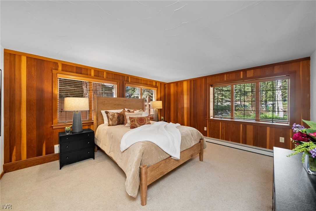 106 Jobs Peak Road Incline Village, NV 89451 - Photo 22 of 49 a spacious bedroom with a bed and a window