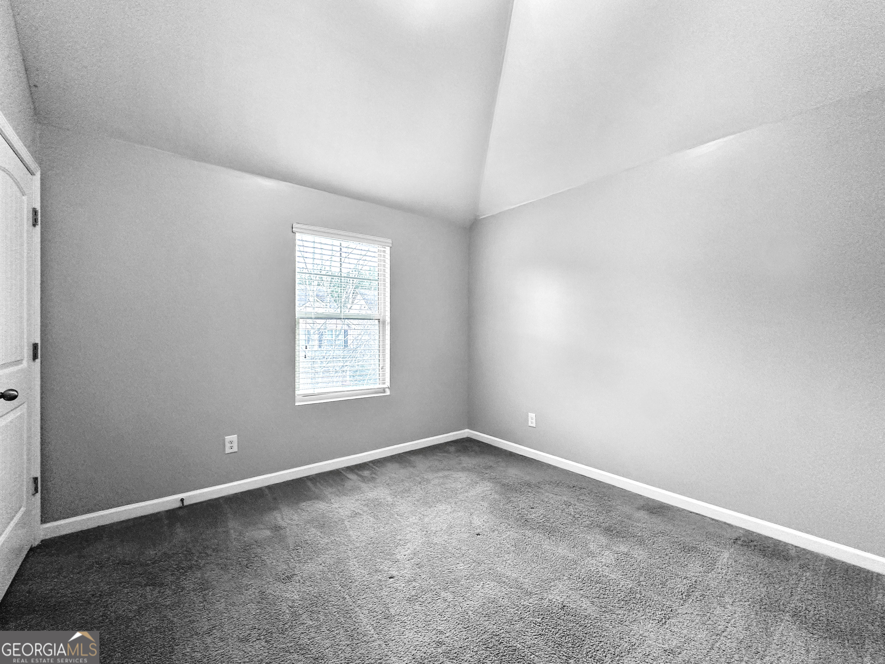 5689 Grande River Road Atlanta, GA 30349 - Photo 14 of 18 an empty room with a window