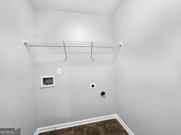 a view of small space with racks on the wall