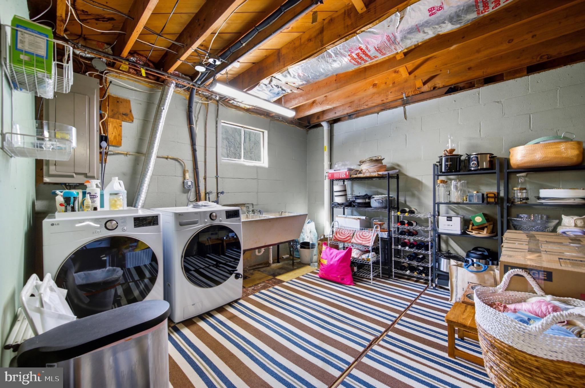6750 Glenkirk Road Baltimore, MD 21239 - Photo 38 of 60 Bright and functional laundry space.