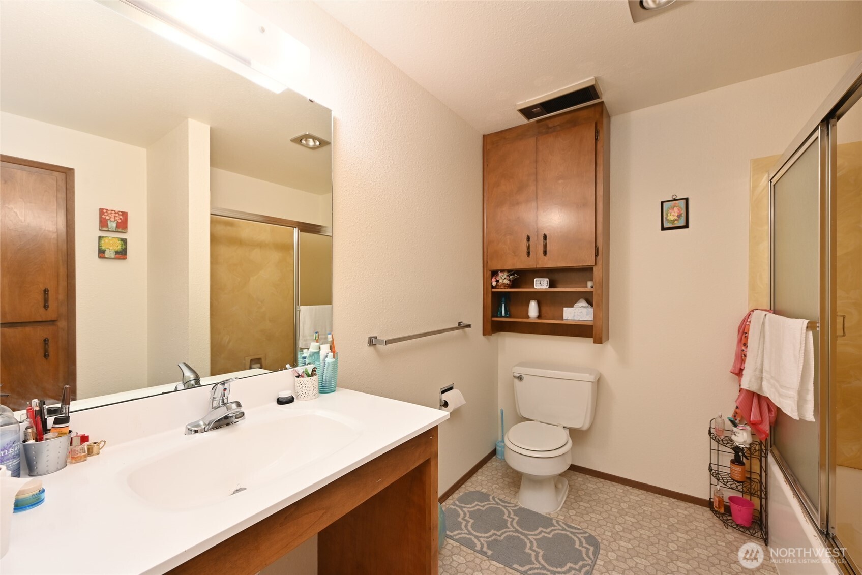 3323 Oakes Avenue, Unit 112 Everett, WA 98201 - Photo 11 of 31 a bathroom with a sink toilet and shower