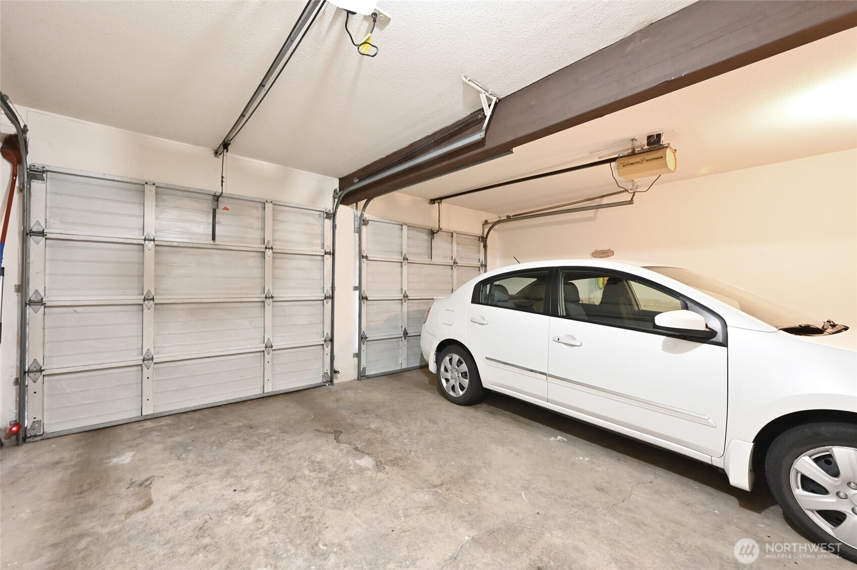 3323 Oakes Avenue, Unit 112 Everett, WA 98201 - Photo 28 of 31 a view of a car garage bed
