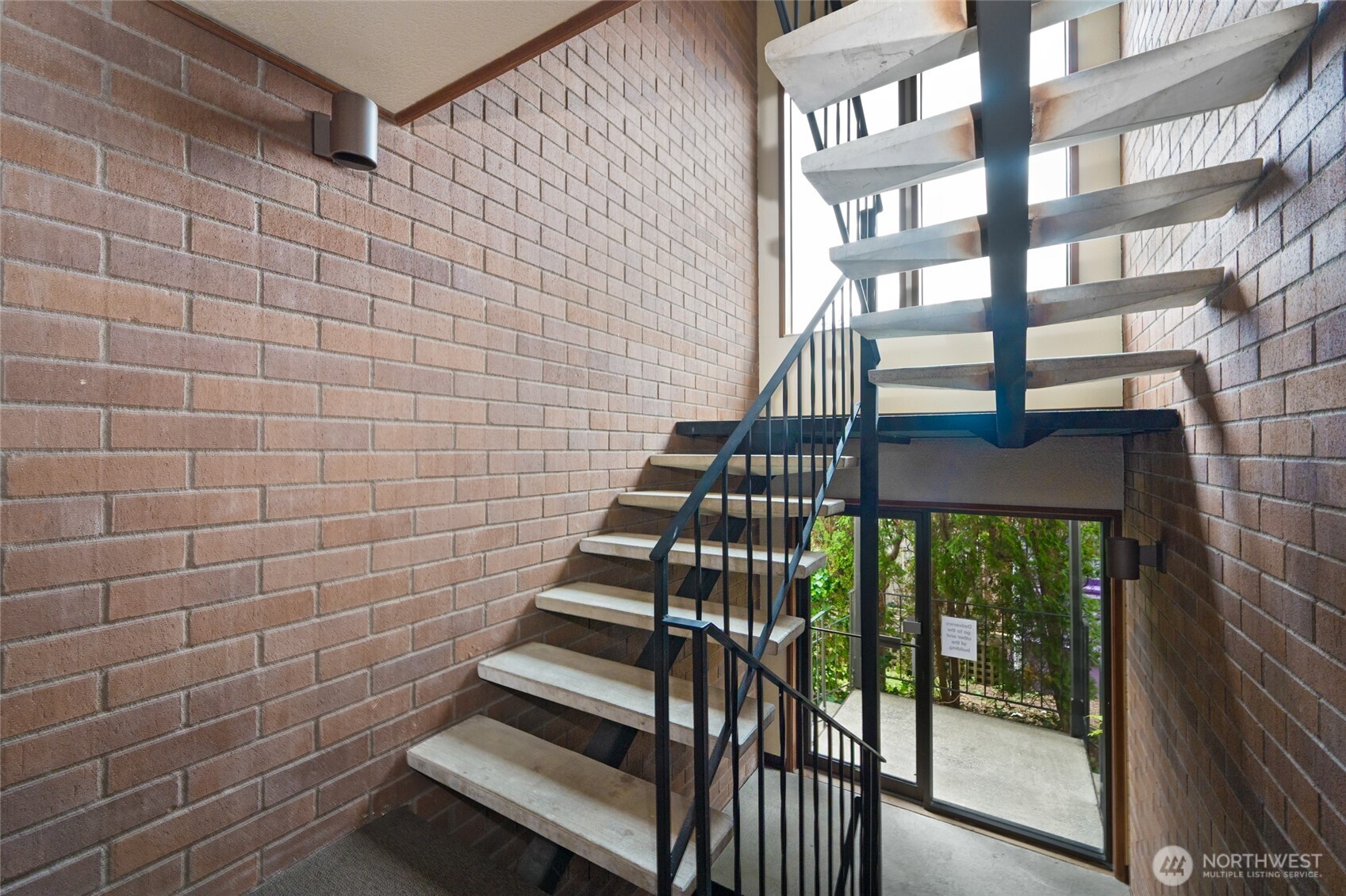 3323 Oakes Avenue, Unit 112 Everett, WA 98201 - Photo 4 of 31 a view of wooden door with a bench