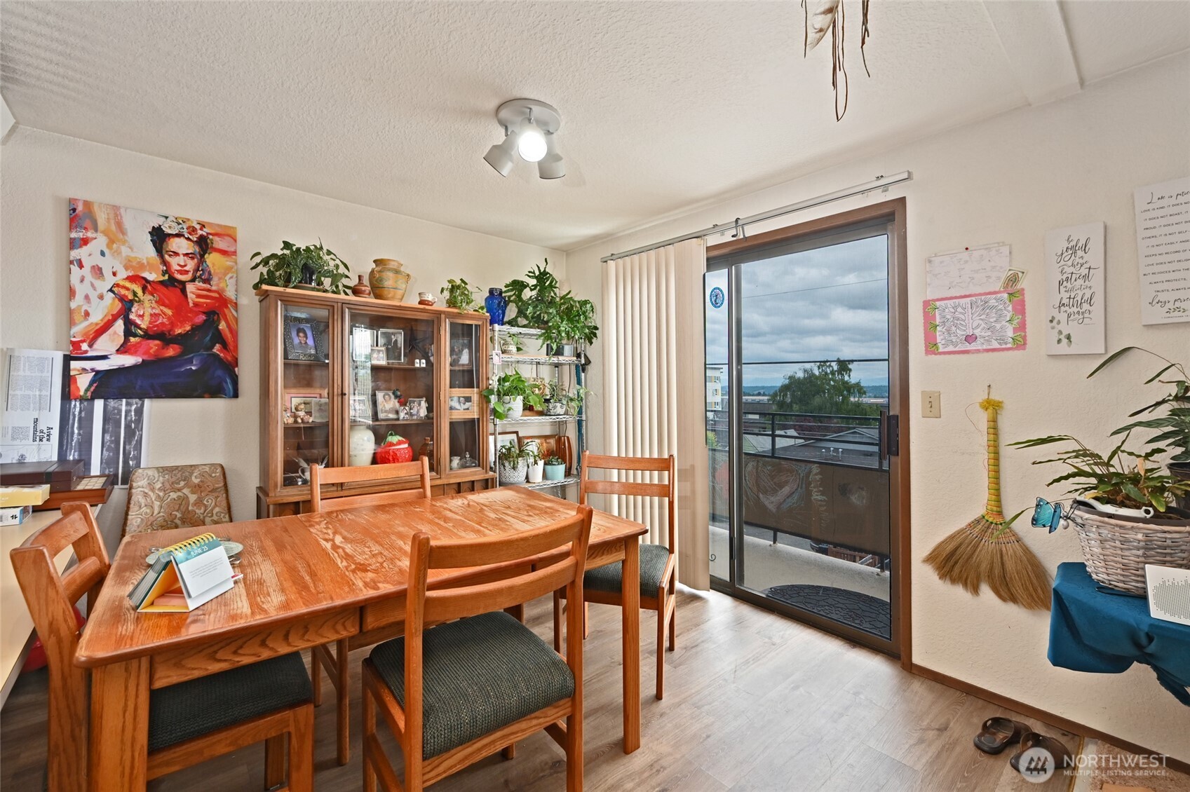 3323 Oakes Avenue, Unit 112 Everett, WA 98201 - Photo 10 of 31 a dining room with furniture a chandelier and window