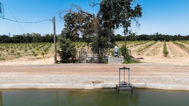 a view of a lake with a outdoor space