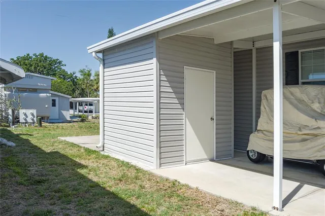 a house view with a backyard space