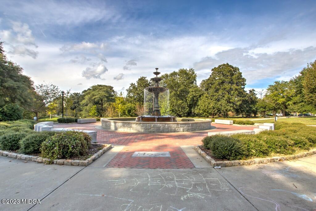 153 Sanders Road Macon, GA 31210 - Photo 4 of 8 a view of yard with swimming pool and green space
